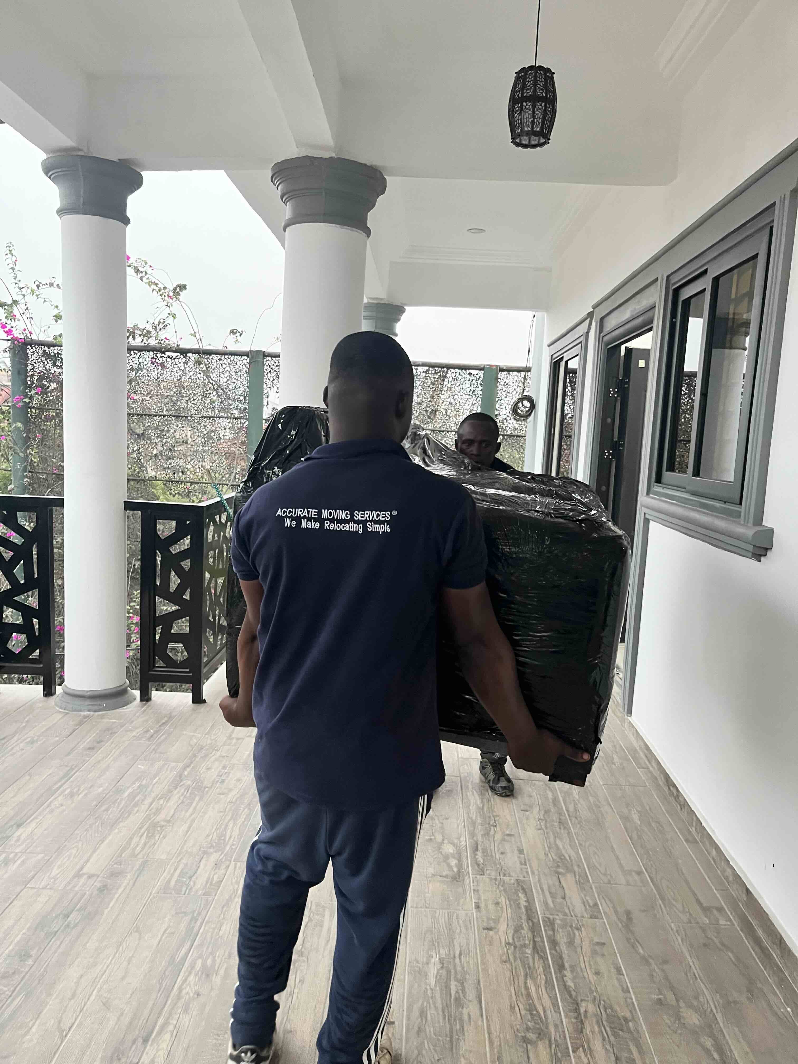 Staff member unpacking in new home